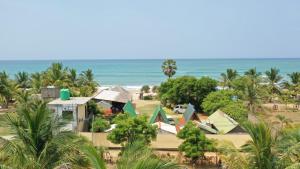 an aerial view of a house on the beach at Thats why beach hotel in Trincomalee