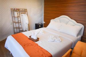 En eller flere senge i et værelse på Mon phuree Glamping