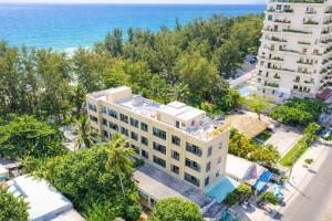 an aerial view of a building next to the ocean at Khách Sạn - Cà Phê Dinh Cô in Long Hai