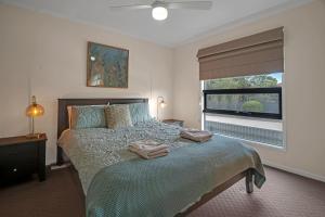 En eller flere senge i et værelse på Long Island Retreat - Pelican