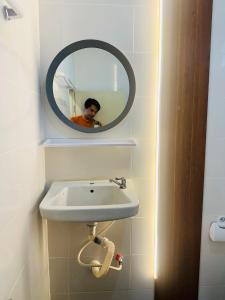 Phòng tắm tại V Rich วีริชเพลส ร้อยเอ็ด +44 ảnh