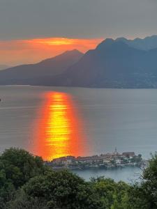 a view of a large body of water at sunset at Panorama in Someraro