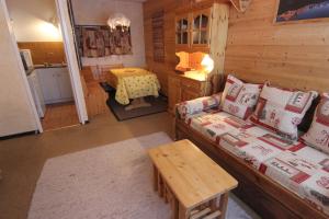 Postel nebo postele na pokoji v ubytování Olympic Appartements VTI