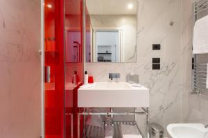 Koupelna v ubytování Hotel Milu Florence + 84 fotografií