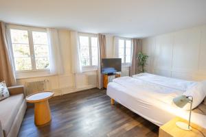 Ένα ή περισσότερα κρεβάτια σε δωμάτιο στο EMMA Bett und Bistro