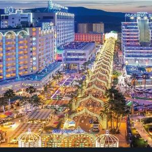 an overhead view of a city with a casino at Apartamentos Marina d'or in El Borseral