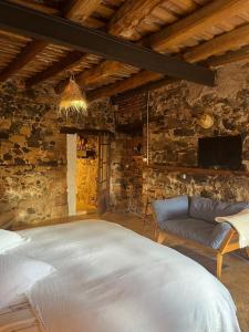 En eller flere senge i et værelse på Can Masferrer