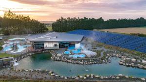 an aerial view of a swimming pool with a resort at Smart Value Premium Alpine Stay Strictly Smoke, Vape & Pet Free in Methven