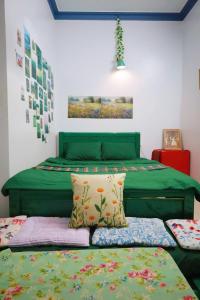 En eller flere senge i et værelse på Jun house - Bến cảng rạch giá