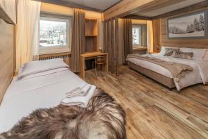 En eller flere senge i et værelse på Hotel la Torre + 51 billeder