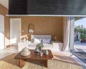 a living room with a couch and a table at Nomad Village in Verviers +50 photos