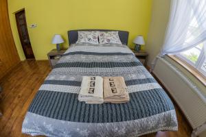 Posteľ alebo postele v izbe v ubytovaní Apartament Zdrojowa 45