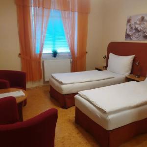 Postel nebo postele na pokoji v ubytování Penzion Greenstar