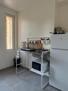 Køkken eller tekøkken på Studio B1 - Centre-Ville Meaux - Proche Disneyland + 12 billeder