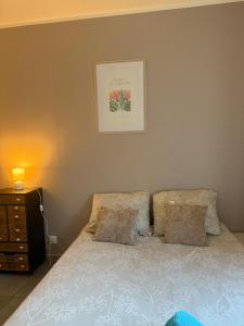 En eller flere senge i et værelse på Studio B1 - Centre-Ville Meaux - Proche Disneyland