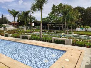 Swimmingpoolen hos eller tæt på Apartasol Citadela Di Sole 1104 - Santafé de Antioquia