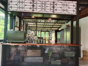 a bar in a restaurant with a counter at My Home Koh Kood1 in Ko Kood