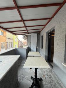 a room with a table on the roof of a building at Atay Apart in Istanbul