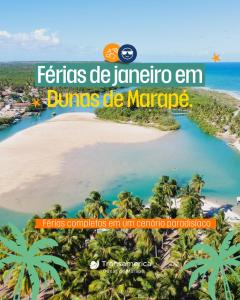 an island in the middle of a beach with palm trees at Transamerica Dunas de Marapé in Jequia da Praia