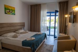 En eller flere senge i et værelse på Complex Turistic Casa Anastasia + 231 billeder