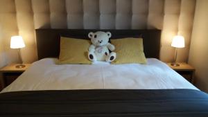 Ein Bett oder Betten in einem Zimmer der Unterkunft Le Chalet de Marguerite