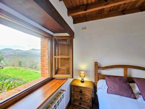 En eller flere senge i et værelse på El Rincon del Castro - Encanto Rural