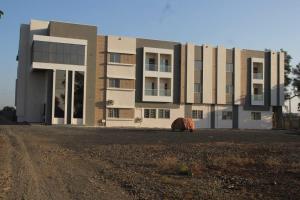 a building with a large animal in front of it at ENERGY Inn in Kotri Kalān