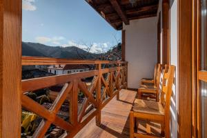 a balcony with a view of the mountains at Villa Martina in Smilyan