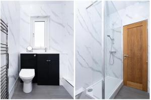 un bagno bianco con wc e doccia di Free Parking - Central - Dunfermline Sleeps 4 a Dunfermline