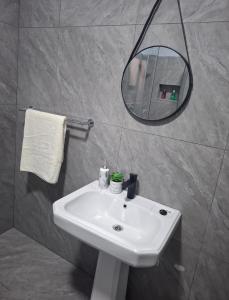 Et badeværelse på Melz & Sno Apartments