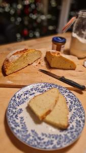 a plate with a slice of bread on a table at Fuori Arena in Casalecchio di Reno