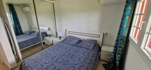 En eller flere senge i et værelse på HARMONY Appart Type Penthouse avec vue imprenable