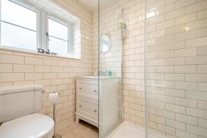 a bathroom with a toilet and a glass shower at 2 Bed in Bewdley oc-n31968 in Bewdley +17 photos