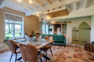a large dining room with a table and chairs at 1 Bed in Linton oc-s31746 in Linton