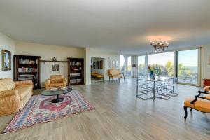 a living room with a couch and a table at Villa Mirador in Padenghe sul Garda