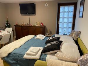 Giường trong phòng chung tại Casa Silvia