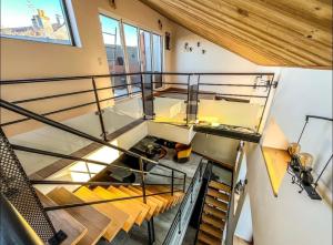 an overhead view of a staircase in a building at Loft Moderne Avec Jacuzzi Roft top Le B in Baccarat
