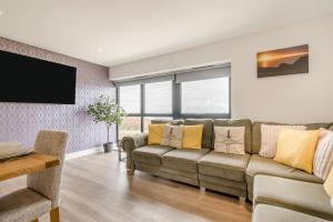 a living room with a couch and a tv at 3 Bed in Tintagel oc-e32938 in Tintagel