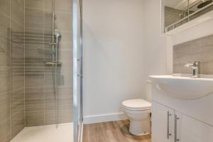 a bathroom with a shower and a toilet and a sink at 3 Bed in Tintagel oc-e32938 in Tintagel +22 photos