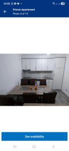 a picture of a room with a table and chairs at Prizren Apartament in Prizren +15 photos