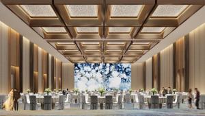 a rendering of a ballroom with tables and chairs at HUALUXE Beihai Silver Beach Resort by IHG in Beihai +75 photos