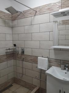 Et badeværelse på APARTMA SEA VIEW