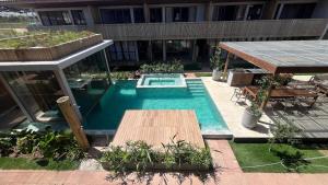 a swimming pool in the middle of a building at Mucugê- Charm Village in Mucugê