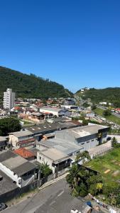 an aerial view of a city with buildings at Ap Alto São Bento in Itapema