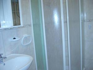 Kúpeľňa v ubytovaní Apartments Dada