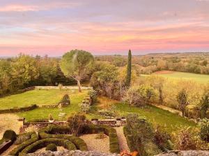 an aerial view of a garden at sunset at Chateau de Montcuquet in Lautrec