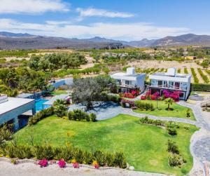 an aerial view of a home with a pool and yard at Yolihuani Relax Resort in Calvillo