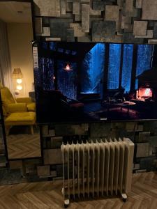 Телевизор и/или развлекательный центр в فلو ابارت