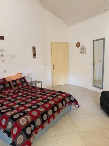 En eller flere senge i et værelse på Villa Maria