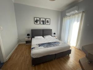 Llit o llits en una habitació de Meraki Inn